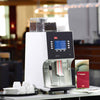 Melitta XT4 Bean To Cup Coffee Machine on a countertop at a cafe